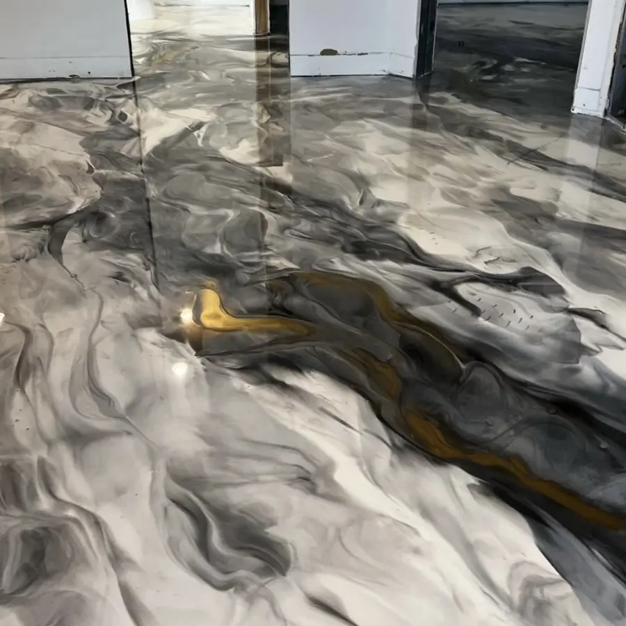 Grey and gold metallic epoxy floor, close up of the swirl